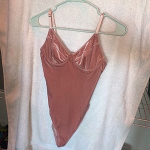 pink velvet body suit